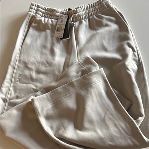 Adidas women’s loose fit, wide leg Sweatpants with side pockets